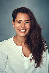 Image showing Woman, happy and portrait or haircare, studio and backdrop for treatment, keratin and proud or confident. Indian female person, beauty and hair for cosmetics, healthy and haircut or shampoo shine