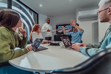 Image showing A diverse group of businessmen collaborates and tests a new virtual reality technology, wearing virtual glasses, showcasing innovation and creativity in their futuristic workspace