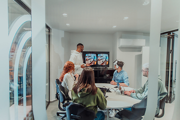 Image showing A diverse group of businessmen collaborates and tests a new virtual reality technology, wearing virtual glasses, showcasing innovation and creativity in their futuristic workspace