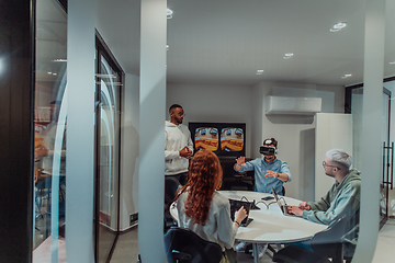 Image showing A diverse group of businessmen collaborates and tests a new virtual reality technology, wearing virtual glasses, showcasing innovation and creativity in their futuristic workspace