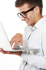 Image showing Nerd, business man typing on laptop and software isolated on a white background. Happy geek in glasses on computer, digital technology and IT programmer coding, writing email online or cyber security