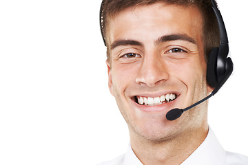 Image showing Call center, happy portrait and man with space for customer service, CRM questions and mockup in studio on white background. Face of telemarketing salesman consulting with microphone for IT advisory