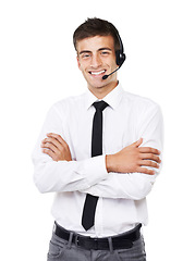 Image showing Call center, man and portrait with arms crossed for customer service, CRM questions or IT support in studio on white background. Happy telemarketing salesman, consultant or microphone for telecom FAQ