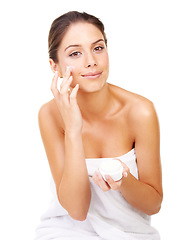 Image showing Skincare, portrait and woman with face cream in studio for product, application or treatment on white background. Smile, beauty or lady model with lotion, sunscreen or cosmetics routine after shower