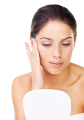 Image showing Woman, face and mirror for skincare, makeup or beauty product isolated against a white studio background. Female person or model applying treatment for facial glow, cleanse or anti aging cosmetics