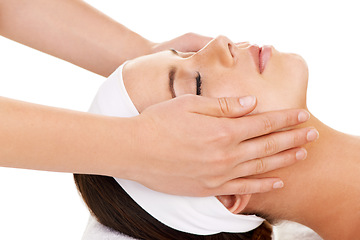 Image showing Face, hands and facial massage with a woman customer in studio isolated on a white background for stress relief. Spa, luxury treatment and a young person at the salon for health, wellness or to relax