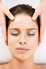 Image showing Spa massage, relax and hands on face of woman from above at a resort for stress relief or wellness. Top view, facial and female with masseuse at a beauty salon for luxury, skincare or dermatology