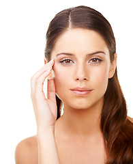 Image showing Portrait, beauty and wellness with a woman in studio isolated on a white background for natural skincare. Face, hand and facial aesthetic cosmetics with a confident young model looking perfect