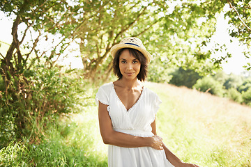 Image showing Portrait, freedom or woman in an outdoor field in the countryside in spring to relax on break. Nature, wellness or biracial female person in garden or farm for fresh air on holiday vacation or travel