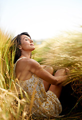 Image showing Relax, summer or calm woman in a field, countryside or outdoor garden for freedom in park or nature. Zen, wellness or female person in farm to breathe in fresh air on holiday vacation or travel