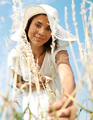 Image showing Portrait, pick wheat or woman in field, nature or outdoors for plant growth or peace in summer. Smile, grass or low angle of female farmer in farm for fresh air, farming or gardening in countryside