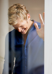 Image showing Smile, fashion and a man laughing while getting ready for an event behind transparent glass in his home. Clothes, luxury and funny with a happy young person dressing or thinking of memory in a hotel