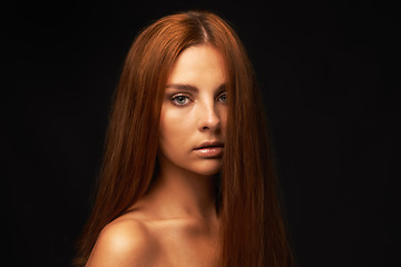 Image showing Hair care, portrait or model with beauty, skincare or results for glow, shine or collagen in studio. Black background, face or serious woman with cosmetics for treatment, healthy texture or growth