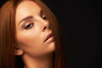 Image showing Hair care, portrait or woman with beauty space, skincare or results for glow, shine or collagen in studio. Black background, face or girl model with mockup for treatment, healthy texture or growth