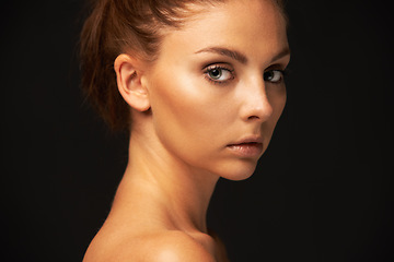 Image showing Skincare, portrait or model with beauty, makeup or results for glow, shine or space in studio. Black background, girl or serious woman with cosmetics for mockup, wellness or foundation on smooth face