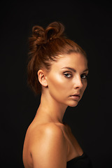 Image showing Hair care, portrait or woman with skincare space, beauty or results for glow, shine or collagen in studio. Black background, face or natural model with mockup for treatment, healthy texture or growth