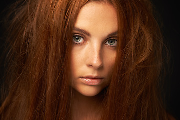 Image showing Hair care, portrait or woman with damage, fail or bad results for transformation or collagen in studio. Black background, face or serious model with cosmetics for treatment, messy texture or growth