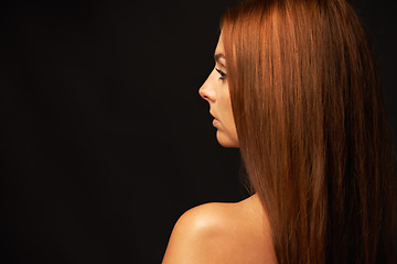 Image showing Hair care, profile or woman thinking of beauty space, skincare or results for glow, shine or collagen. Black background, back view or model with cosmetics for healthy texture or growth in studio