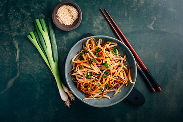 Image showing Spicy mung bean sprouts salad with garlic, sesame seeds, green onions, soy sauce, spices and red pepper. 