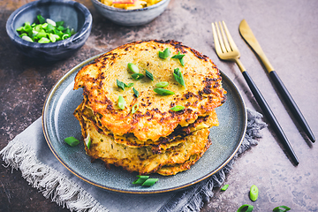 Image showing Homemade hash browns or potato pancake with cabbage salad and green onions