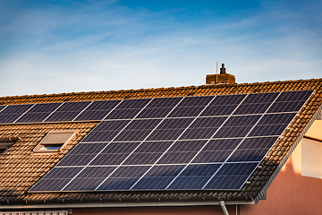 Image showing Photovoltaic panels on the roof of family house, solar panels. 