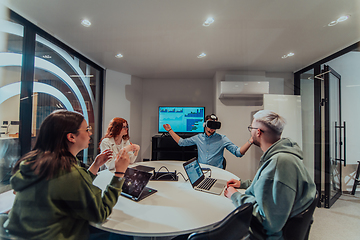 Image showing A diverse group of businessmen collaborates and tests a new virtual reality technology, wearing virtual glasses, showcasing innovation and creativity in their futuristic workspace