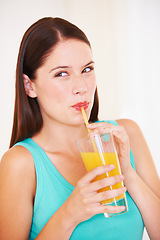 Image showing Happy, drink and face of woman with juice for nutrition, wellness and hydration in studio. Excited, smile and person with fruit blend or beverage for vitamins, detox and diet on white background