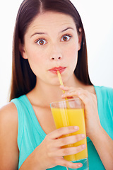 Image showing Shock, drinking and portrait of woman with juice for nutrition, wellness and hydration in studio. Surprise, comic and face of person with fruit blend for vitamins, detox and diet on white background