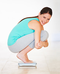 Image showing Scale, check and woman lose weight in portrait happiness, diet and measuring body, mass and health. Weighing, bmi and person excited with a smile for numbers, progress and dieting results in home