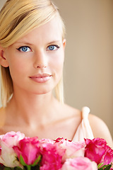 Image showing Woman, bouquet and pink roses in portrait, present and natural plants with beauty on birthday. Girl, flowers and makeup with gift, prize or valentines day celebration at event with reward giveaway