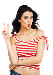 Image showing Fashion, portrait and woman with peace, hands or kiss gesture in studio on white background. V, sign and face of female model with trendy outfit or thank you, cool or good vibes, emoji or expression