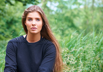 Image showing Outdoor, woman and portrait with exercise fashion with style and trendy clothing with confidence. Park, garden and fitness for wellness of a female athlete from Germany with training for health