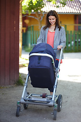 Image showing Woman, stroller or smile on outdoor walk or baby childhood development, fresh air or weekend activity. Female person, push carriage in park for summer bonding love together, parenting on calm morning