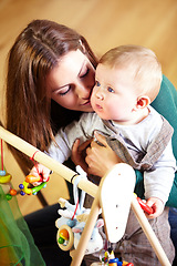 Image showing Woman, baby and holding for playing with toys in living room for childhood development in home. Mother, son and bonding for love, trust or together by support in growth, future and hope with care