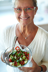 Image showing Portrait, smile and senior woman with salad for healthy diet, nutrition and wellness in glasses. Face, happy person and bowl of vegetables, organic vegan food and benefits, detox and lunch in home