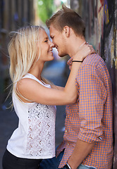 Image showing Love, city and couple hug on road for date, cute relationship and bonding outdoors on weekend. Dating, romance and happy man and woman embrace for flirting, connection and adventure in urban town