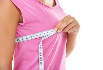 Image showing Chest, measure tape and hand of woman for wellness, breast augmentation and plastic surgery in studio mockup. Model, cosmetic and boobs beauty for silicone implants, healthcare and white background