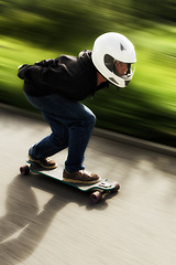 Image showing Man, longboard and speed with motion blur on road with helmet for exercise, fitness and outdoor in summer. Person, skateboard and fast in street with thinking for extreme sports, training or moving