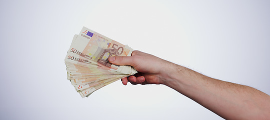 Image showing Cash in hand, finance and wealth with bonus, euro notes or bills with lotto winner on white background. Financial freedom, rich person and money fan with payment, investment or savings in a studio