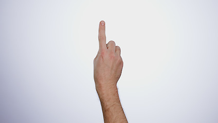 Image showing Finger, hand and click tablet in studio isolated on a white background mockup space. Closeup, touchscreen and press, scroll or swipe on digital technology, phone and gesture on mobile internet app.