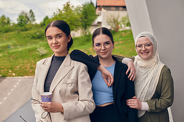 Image showing A group of professional businesswomen taking a break, sipping coffee and engaging in discussions, fostering a sense of empowerment and collaboration in the modern workplace.