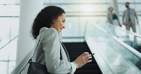 Image showing Business woman, phone text and airport with travel, smile and commute for work. Mobile, transport and online with a female person with journey and worker vacation with bag and happy on escalator