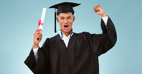 Image showing Graduation, man and celebration of certificate in education, college or university success isolated on a blue background. Portrait, african graduate and yes of award, diploma or achievement in studio