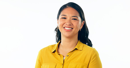 Image showing Portrait, smile and a young asian woman isolated on a white background in studio looking confident or positive. Face, happy and satisfaction with a korean girl in a casual clothes outfit for fashion