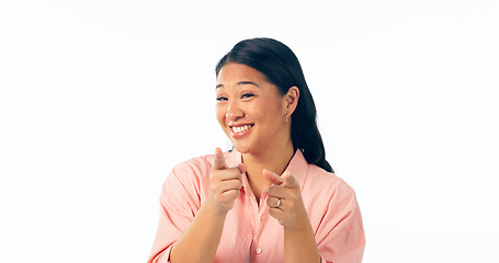 Image showing Portrait, smile and pointing with an asian woman isolated on a white background to vote for you. Decision, choice and hand gesture of a happy young person looking confident in her option or selection