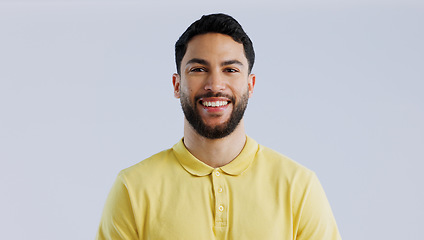 Image showing Man, portrait and smile in studio with fashion, casual style and confidence on white background with mock up space. Person, face and happiness, pride and joyful expression with cool outfit or clothes