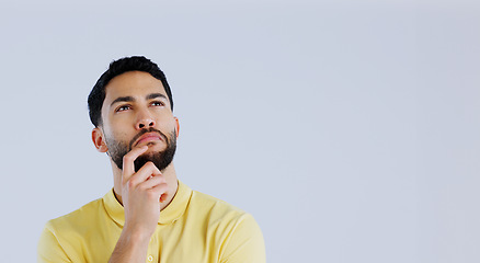 Image showing Man, space and thinking of ideas in studio for planning insight, future decision and inspiration on mockup white background. Curious indian model brainstorming solution, remember memory and questions