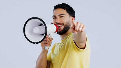 Image showing Man, megaphone and studio portrait to point at you for choice, recruitment or announcement by background. Speaker, protest or call to action for accountability with speech, sound or noise on bullhorn