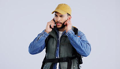 Image showing Hiking, man and phone call service, frustrated and studio isolated on a white background mockup space. Person trekking, mobile and lost connection signal, confused and backpacker in communication