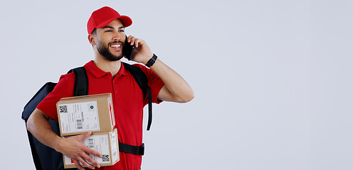 Image showing Delivery man, phone call and box in studio, space and mockup in talk for location, info or supply chain by background. Courier, smartphone and backpack with cardboard package, product and promotion